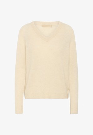 Kreemist V-kaelusega sviiter, pehme kudumiga. Omab pikki varrukaid, soonikkoes mansette ja lõdva lõikega. Peene tekstuur üle kogu pinna.