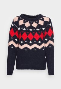Pull en maille avec une base bleu marine ornée de motifs géométriques en rouge, rose et blanc. Col rond et poignets et ourlet côtelés.