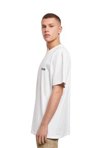 Merchcode UNFOLLOW FRONT  OVERSIZE  - T-shirts med print - white