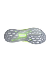Semelle de chaussure en gris et vert fluo, avec un motif en caoutchouc texturé et des fentes de ventilation pour la respirabilité et l'adhérence.