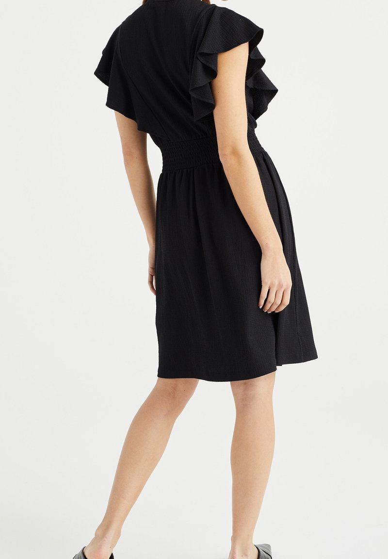 Robe Noire Banana Republic Taille 14 - Occasion Très Bon état, Coupe Légèrement évasée