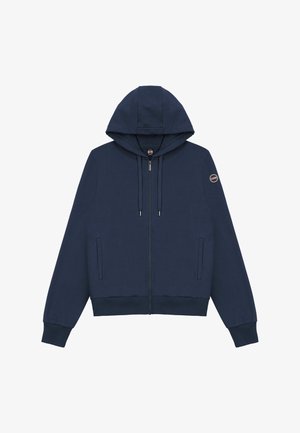 Tengerészkék cipzáras kapucnis pulóver elülső zsebekkel, állítható húzózsinóros kapucnival, bordázott mandzsettákkal és szegéllyel, valamint Colmar logóval a bal ujján.