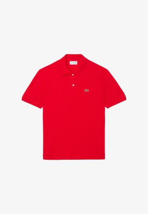 Polo shirt punainen, joka on valmistettu puuvillasta, jossa on taitettu kaulus, lyhyet hihat ja pieni vihreä krokotiililogo rinnassa.