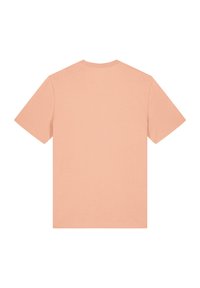 Korte mouwen, ronde hals t-shirt in een zachte perzikkleur. Gemaakt van katoen met een zachte textuur. Effen achterkant, geen patronen of versieringen.