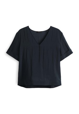 Haut marine à manches courtes avec un col en V, en tissu texturé et à coupe décontractée, avec des manches roulées et un ourlet droit.