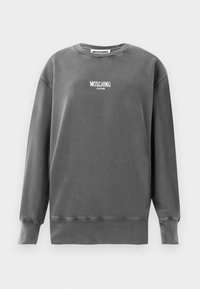 Sudadera gris de mezcla de algodón con puños y dobladillo acanalados. Presenta el logotipo bordado en blanco "MOSCHINO JEANS" en la parte frontal.
