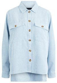 Vaaleansininen corduroypaita, jossa on napitettava etuosa, kaksi rintataskua ja puunappeja. Ominaisuuksiin kuuluvat pitkät hihat ja hieman kaareva helma.