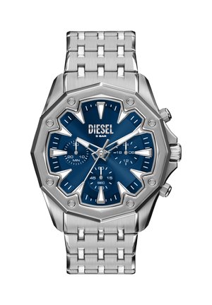 Silberne Armbanduhr aus Edelstahl mit achteckigem Gehäuse und blauem Zifferblatt. Verfügt über markante Stundenmarker, Unterzifferblätter und ein gebürstetes Metallarmband.