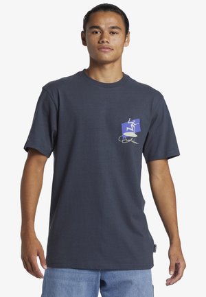 Navy blue cotton t-shirt with a crew neckline, short sleeves, and a graphic design featuring a purple box and logo on the left chest.