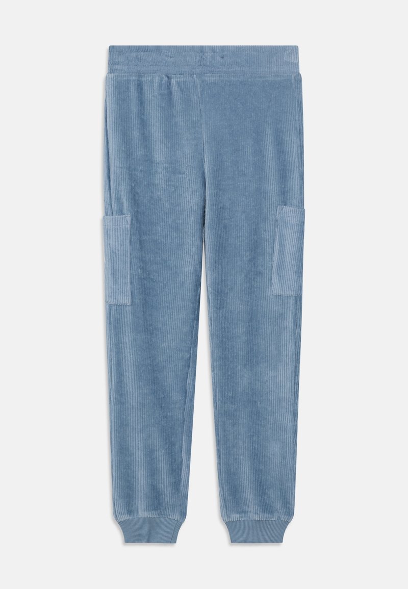 Pantalon en velours côtelé bleu doux avec taille élastique, poches plaquées latérales et bords côtelés aux chevilles.