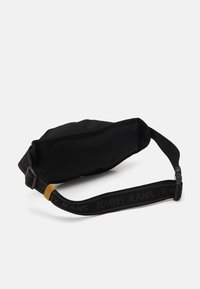 Tommy Hilfiger TJM ESSENTIAL DAILY - Bum bag - black