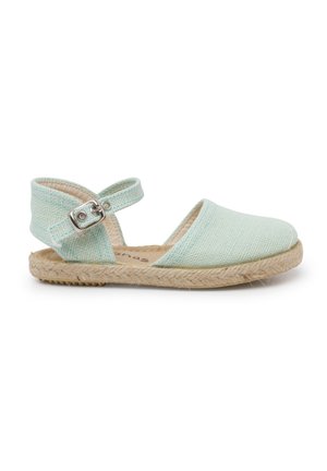 Espadrillas in tela verde menta chiaro con suola in juta intrecciata e cinturino regolabile. Presentano una punta arrotondata e un design con tacco aperto.