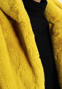 Derhy Winter coat - yellow