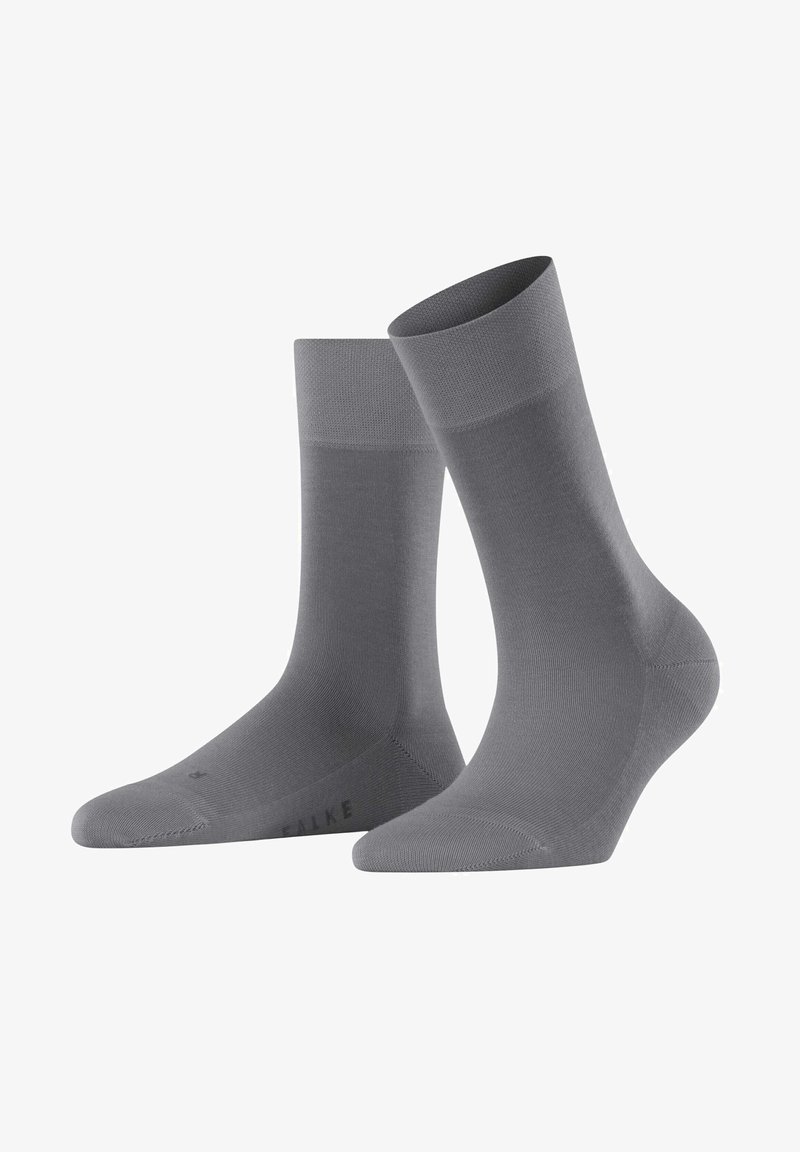 Gray socks with a smooth, lightweight texture; mid-calf length featuring a ribbed upper and reinforced toe and heel areas.