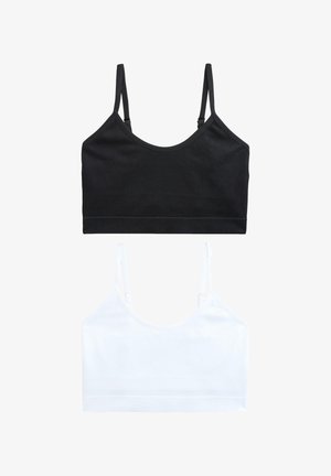 Dos tops cortos sin costuras, uno negro y otro blanco, con tirantes finos ajustables, mostrados sobre un fondo blanco.
