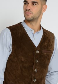 JCC Väst - brown