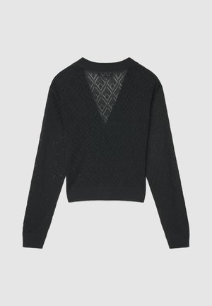 Pull noir en maille avec motif en losange, dos en V, manches longues et ourlet côtelé. Texture légère et coupe courte.