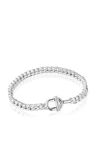 Pulsera de cadena de plata con eslabones entrelazados y cierre de palanca. Textura suave y pulida con un acabado brillante. Diseño minimalista.