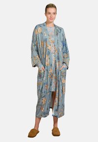 Floral-patterned blue kimono with long sleeves, featuring pockets and striped accents. Grounded fabric with slight texture.