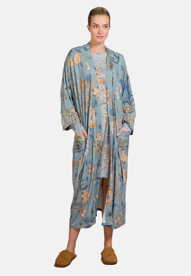 Floral-patterned blue kimono with long sleeves, featuring pockets and striped accents. Grounded fabric with slight texture.