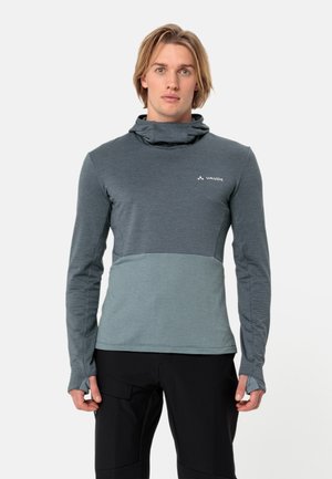 Grijze en teal lange mouwen technische shirt met een hoge nek, voorzien van een gestructureerd ontwerp en duimgaten in de mouwen. VAUDE logo zichtbaar.
