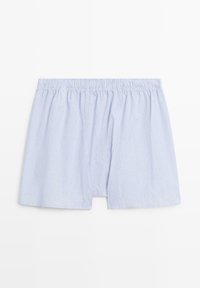 Pantaloncini in cotone a righe blu e bianche con una vita elastica, dotati di una vestibilità ampia e fianchi aperti per facilitare il movimento.