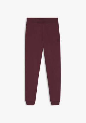 Burgundy sweatpants with a fitted design, made of soft fabric. Features a small, embossed logo near the waistband and cuffed ankles.