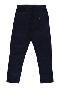 Navyblå kordfloddsbyxor med elastisk midja, två bakfickor och en liten logotyp på den högra fickan.