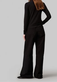 Calvin Klein Pitkähihainen paita - black