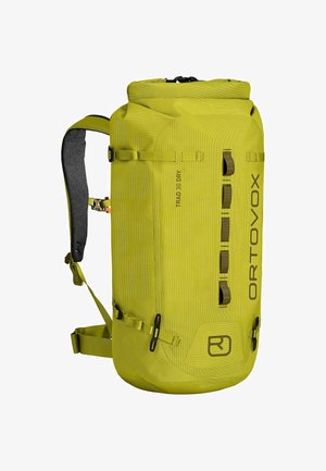 Yellow waterproof backpack with a roll-top closure, adjustable padded straps, and multiple attachment points for gear. Textured surface.