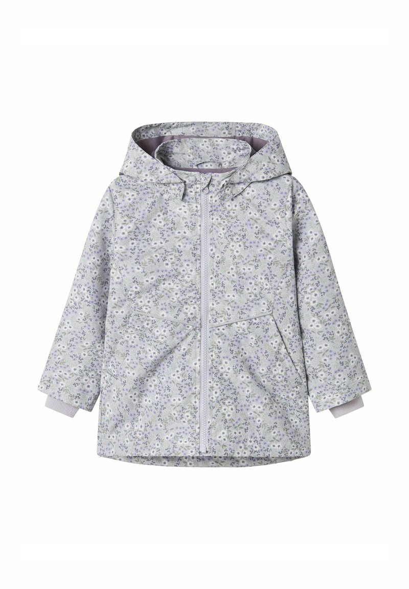 Veste gris clair avec un petit motif floral violet et blanc, fermeture éclair à l'avant, capuche et poignets élastiques. Elle possède deux poches avant.