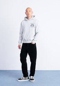 Carhartt WIP NEWEL PANT - Hlače - black rinsed