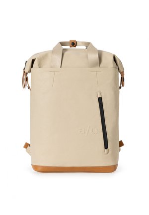 Beige roll-top backpack with a smooth texture, tan leather accents, a front zip pocket, and a logo embossed on the front. Features sturdy straps.