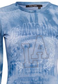 Blauses Langarm-Oberteil mit einem verwaschenen Denim-Look. Mit "LOS ANGELES" Grafik und einem mit Diamantenakzenten versehenen "LA" Emblem. Weiche Textur.