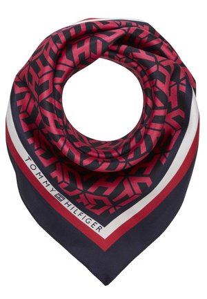 Foulard en soie avec motif géométrique rouge et noir, bordure marine et rouge, et logo "Tommy Hilfiger" le long du bord.