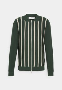 Grön zip-up cardigan med vertikala vita och beigea ränder, en klassisk krage och ribbade manschetter. Mjuk, stickad textur genom hela plagget.