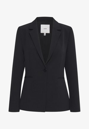 Blazer noir avec une fermeture à un bouton, revers crantés et poches latérales. Coupe ajustée et tissu lisse et structuré. Étiquette de marque visible.
