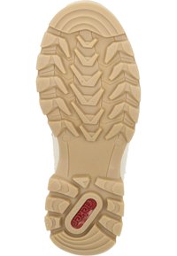 Semelle en caoutchouc présentant un motif de bande de roulement robuste en beige avec un détail de logo rouge. Surface texturée pour une meilleure adhérence et stabilité.