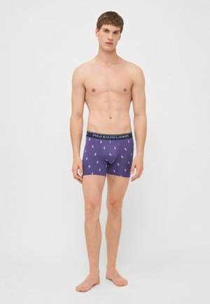 Paarse boxershorts met witte polo-logo patronen, elastische tailleband met "POLO RALPH LAUREN", comfortabele pasvorm, zachte katoenmix.