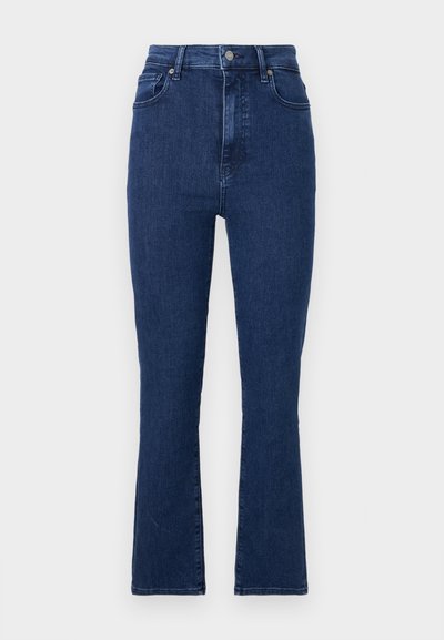 Tummansiniset korkea vyötäröiset farkut, jotka on valmistettu denimpistä ja joissa on suora lahkeensuu. Niissä on etutaskut ja metallinen nappikiinnitys.