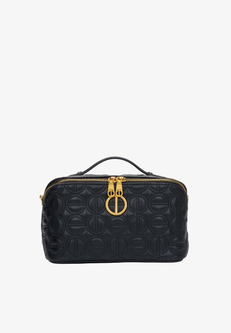 Zwarte leren tas met gequilte ronde patronen, gouden rits en hardware, vlakke structuur en handvat aan de bovenkant voor draaggemak.