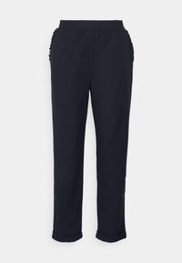 Svarta byxor i mjukt material, med elastisk midja, sidofållsdetaljer och uppvikta nederkanter.