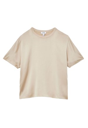 T-shirt beige a maniche corte con scollo rotondo, vestibilità comoda e piccola etichetta bianca sul collo con informazioni sul marchio e sulla taglia.