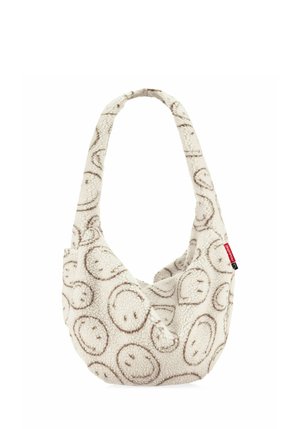 Borsa a tracolla in tessuto morbido con motivi di faccine marroni su sfondo bianco testurizzato e un'etichetta rossa del marchio sul lato.