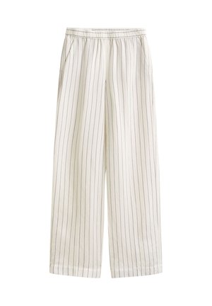 Pantalon blanc à jambes larges avec de fines rayures verticales noires et une ceinture élastique avec poches latérales.