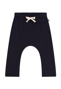 Marineblaue Baumwoll-Jogginghosen mit einer lockeren Passform, ausgestattet mit einem elastischen Bund und einem cremefarbenen Zugband. Flache Nähte am Saum.