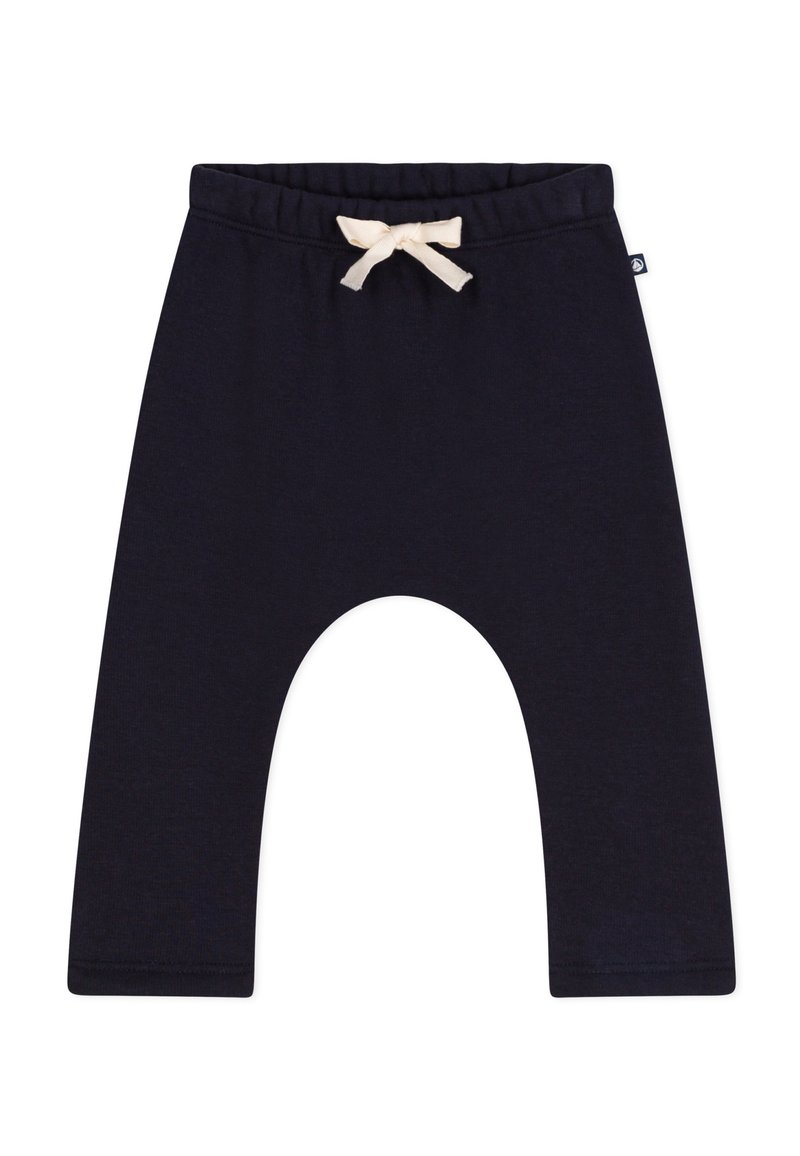 Marineblaue Baumwoll-Jogginghosen mit einer lockeren Passform, ausgestattet mit einem elastischen Bund und einem cremefarbenen Zugband. Flache Nähte am Saum.