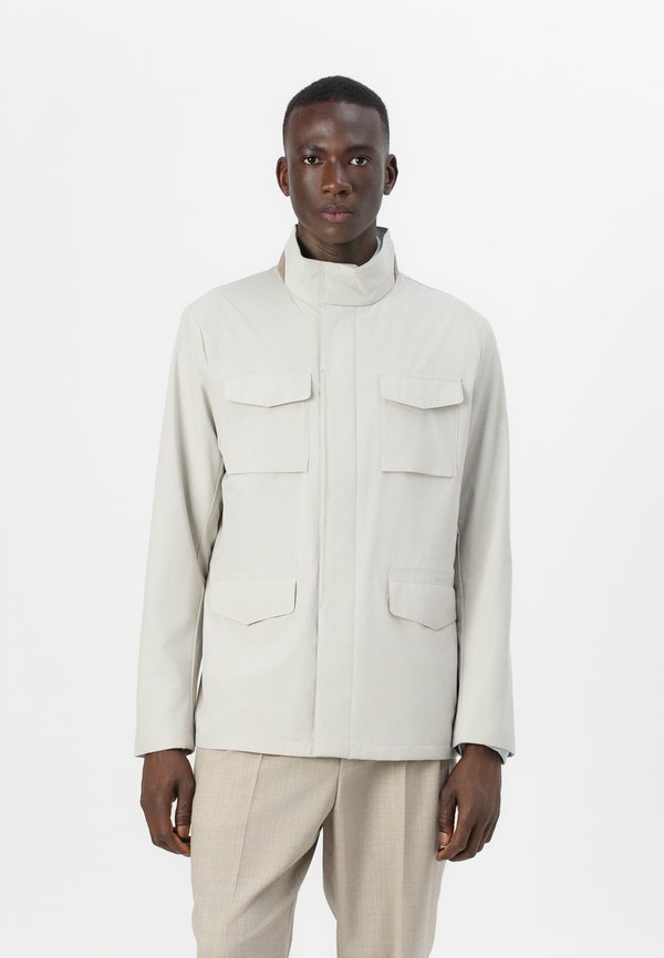 TECH VELO - Waterproof jacket - stone beige