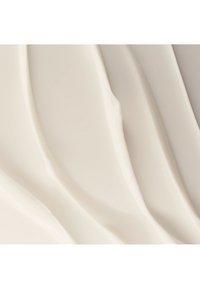 Blanka, glansig material med mjuka, flödande vågor och subtila texturvariationer. Ytan verkar mjuk och vågig, vilket skapar djup.