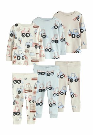 Three sets of children's long-sleeve tops and pants in cream, blue, and beige with construction vehicle and nature-themed prints.